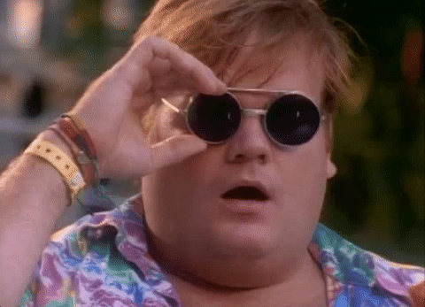 Chris Farley removing his sunglasses in slow motion